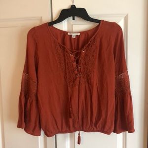 Burnt orange American eagle shirt